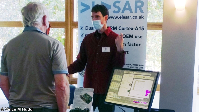Rob Sprowson demonstrating his air guitar technique to Martin Avison on the Elesar stand at London 2021