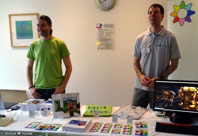 Steve and Rob modelling the new tops on the RISC OS Open Ltd stand at London 2019